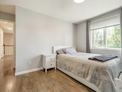338 Deer Run Place West, Rural Lethbridge County, AB - Indoor Photo Showing Bedroom