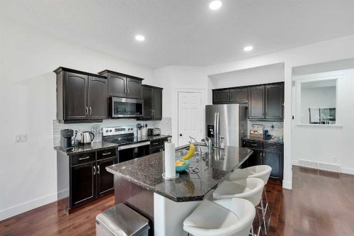 6 Aspen Stone Mews Sw, Calgary, AB - Indoor Photo Showing Kitchen With Upgraded Kitchen