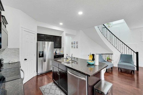 6 Aspen Stone Mews Sw, Calgary, AB - Indoor Photo Showing Kitchen With Double Sink