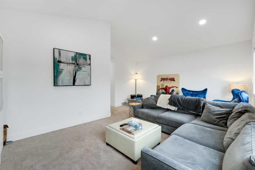 6 Aspen Stone Mews Sw, Calgary, AB - Indoor Photo Showing Living Room