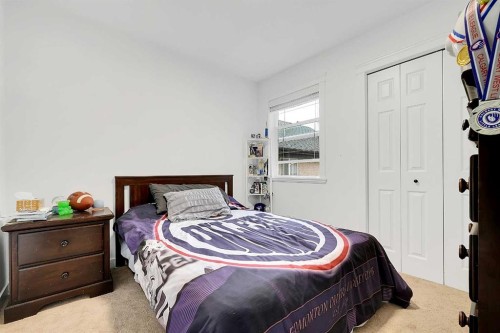 6 Aspen Stone Mews Sw, Calgary, AB - Indoor Photo Showing Bedroom