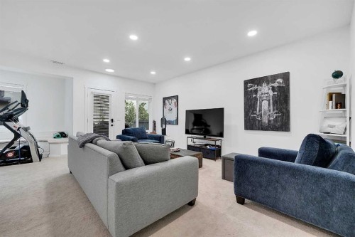 6 Aspen Stone Mews Sw, Calgary, AB - Indoor Photo Showing Living Room