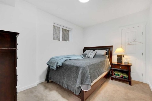 6 Aspen Stone Mews Sw, Calgary, AB - Indoor Photo Showing Bedroom