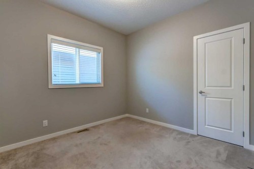 39 Walcrest View Se, Calgary, AB - Indoor Photo Showing Other Room