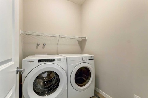 39 Walcrest View Se, Calgary, AB - Indoor Photo Showing Laundry Room
