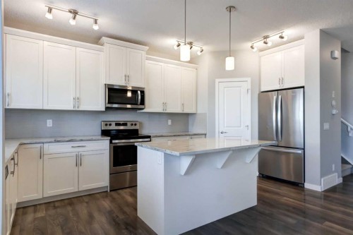 39 Walcrest View Se, Calgary, AB - Indoor Photo Showing Kitchen With Stainless Steel Kitchen With Upgraded Kitchen