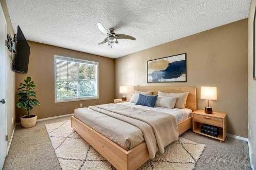 80 Elgin Gardens Se, Calgary, AB - Indoor Photo Showing Bedroom