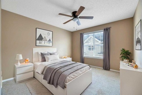 80 Elgin Gardens Se, Calgary, AB - Indoor Photo Showing Bedroom