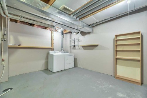 80 Elgin Gardens Se, Calgary, AB - Indoor Photo Showing Laundry Room