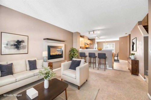 80 Elgin Gardens Se, Calgary, AB - Indoor Photo Showing Living Room
