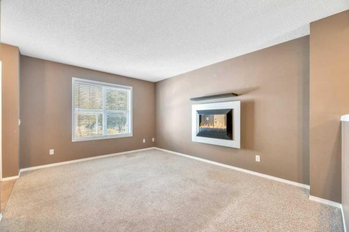 80 Elgin Gardens Se, Calgary, AB - Indoor With Fireplace