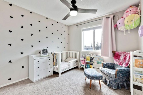 227 Cranford Way Se, Calgary, AB - Indoor Photo Showing Bedroom