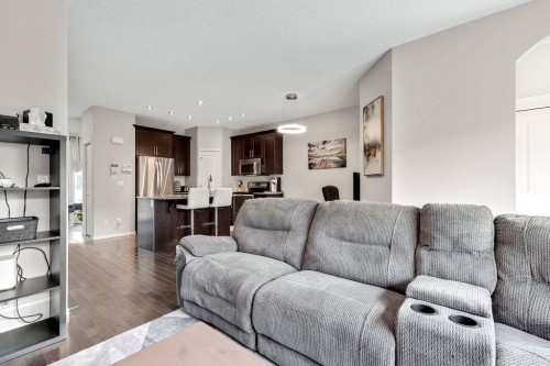 227 Cranford Way Se, Calgary, AB - Indoor Photo Showing Living Room