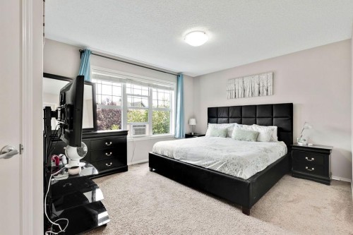 227 Cranford Way Se, Calgary, AB - Indoor Photo Showing Bedroom