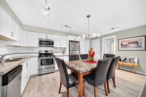 5210-279 Copperpond Common Se, Calgary, AB - Indoor Photo Showing Kitchen With Stainless Steel Kitchen With Double Sink With Upgraded Kitchen