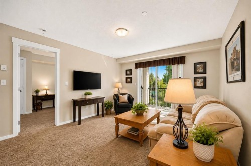 5210-279 Copperpond Common Se, Calgary, AB - Indoor Photo Showing Living Room