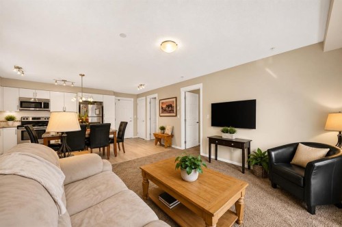 5210-279 Copperpond Common Se, Calgary, AB - Indoor Photo Showing Living Room