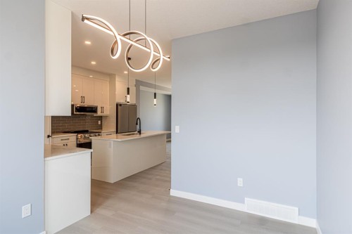1995 Mccaskill Drive, Crossfield, AB - Indoor Photo Showing Kitchen