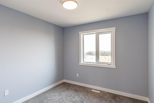 1995 Mccaskill Drive, Crossfield, AB - Indoor Photo Showing Other Room