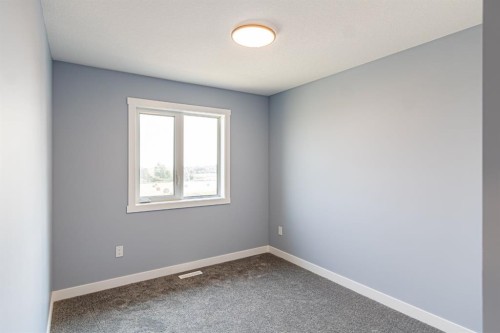 1995 Mccaskill Drive, Crossfield, AB - Indoor Photo Showing Other Room
