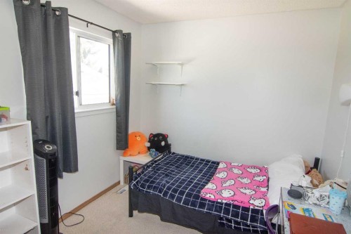 3850 Catalina Boulevard Ne, Calgary, AB - Indoor Photo Showing Bedroom