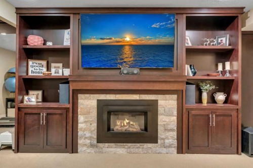 72 Quarry Landing Se, Calgary, AB - Indoor With Fireplace