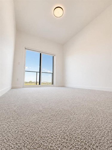 1005-200 Belvedere Boulevard Se, Calgary, AB - Indoor Photo Showing Other Room