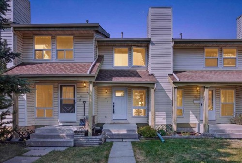 21 Woodhill Court Sw, Calgary, AB - Outdoor With Deck Patio Veranda With Facade