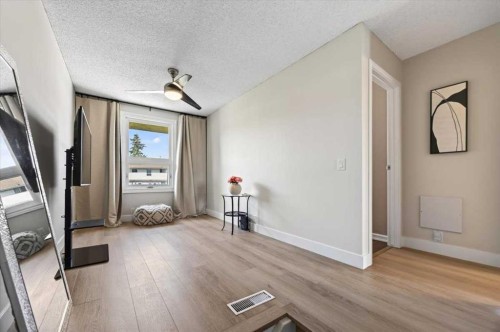 21 Woodhill Court Sw, Calgary, AB - Indoor Photo Showing Other Room