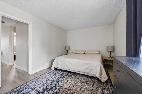 21 Woodhill Court Sw, Calgary, AB - Indoor Photo Showing Bedroom