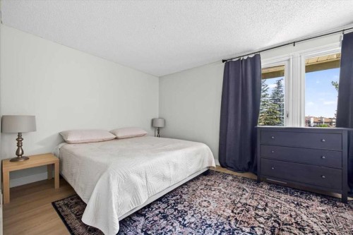 21 Woodhill Court Sw, Calgary, AB - Indoor Photo Showing Bedroom