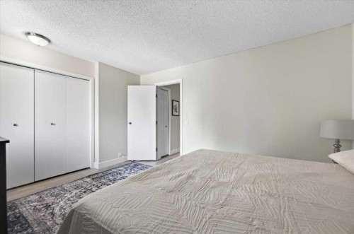 21 Woodhill Court Sw, Calgary, AB - Indoor Photo Showing Bedroom