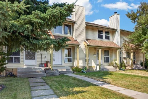 21 Woodhill Court Sw, Calgary, AB - Outdoor With Facade