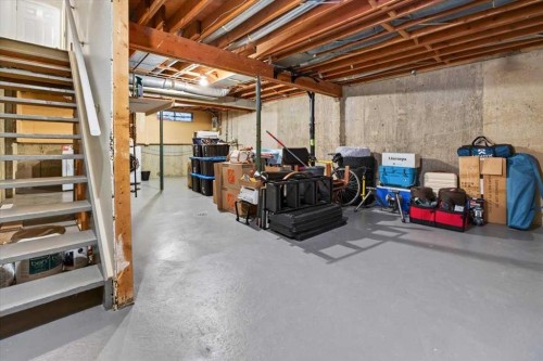 21 Woodhill Court Sw, Calgary, AB - Indoor Photo Showing Basement