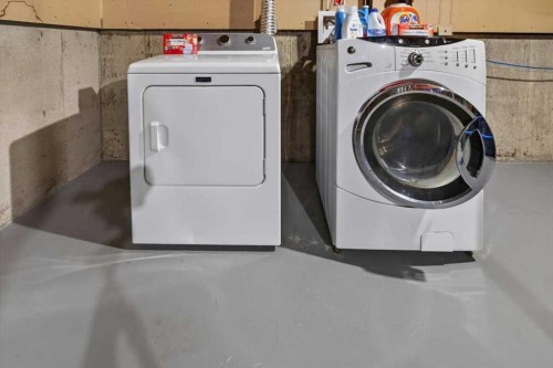 21 Woodhill Court Sw, Calgary, AB - Indoor Photo Showing Laundry Room