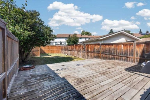 21 Woodhill Court Sw, Calgary, AB - Outdoor With Deck Patio Veranda