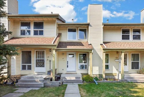 21 Woodhill Court Sw, Calgary, AB - Outdoor With Deck Patio Veranda With Facade