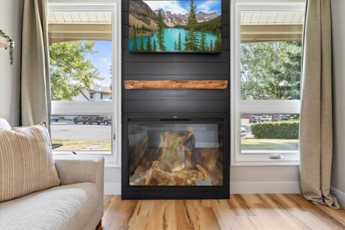 21 Woodhill Court Sw, Calgary, AB - Indoor With Fireplace