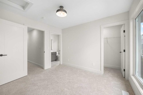 301-67 Panatella Square Nw, Calgary, AB - Indoor Photo Showing Other Room