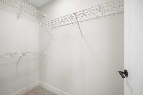 301-67 Panatella Square Nw, Calgary, AB - Indoor With Storage