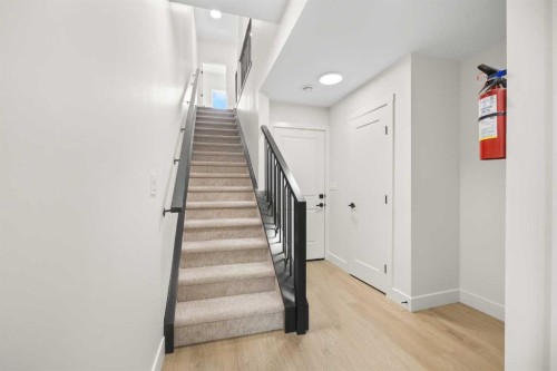 301-67 Panatella Square Nw, Calgary, AB - Indoor Photo Showing Other Room