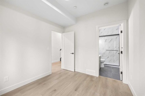 301-67 Panatella Square Nw, Calgary, AB - Indoor Photo Showing Other Room