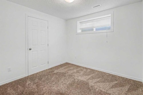 18 Collingwood Place Nw, Calgary, AB - Indoor Photo Showing Other Room