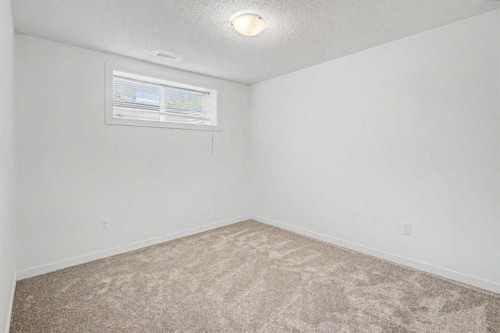 18 Collingwood Place Nw, Calgary, AB - Indoor Photo Showing Other Room