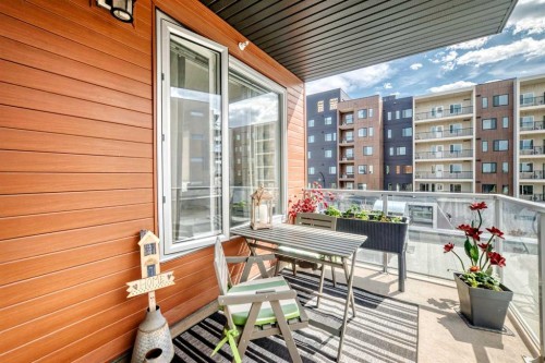 402-30 Shawnee Common Sw, Calgary, AB - Outdoor With Balcony