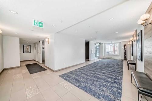 402-30 Shawnee Common Sw, Calgary, AB - Indoor Photo Showing Other Room