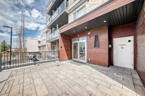 402-30 Shawnee Common Sw, Calgary, AB - Outdoor With Balcony With Exterior