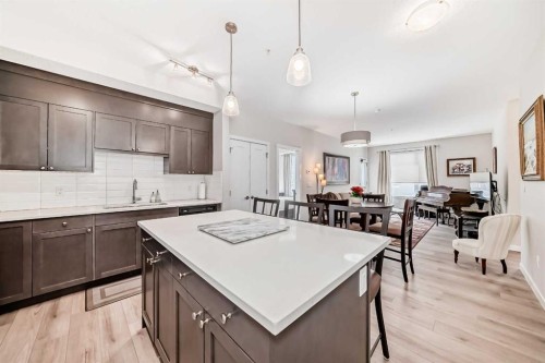 402-30 Shawnee Common Sw, Calgary, AB - Indoor Photo Showing Kitchen With Upgraded Kitchen