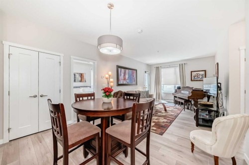 402-30 Shawnee Common Sw, Calgary, AB - Indoor Photo Showing Dining Room