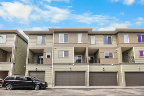 302-67 Panatella Square Nw, Calgary, AB - Outdoor With Balcony With Facade